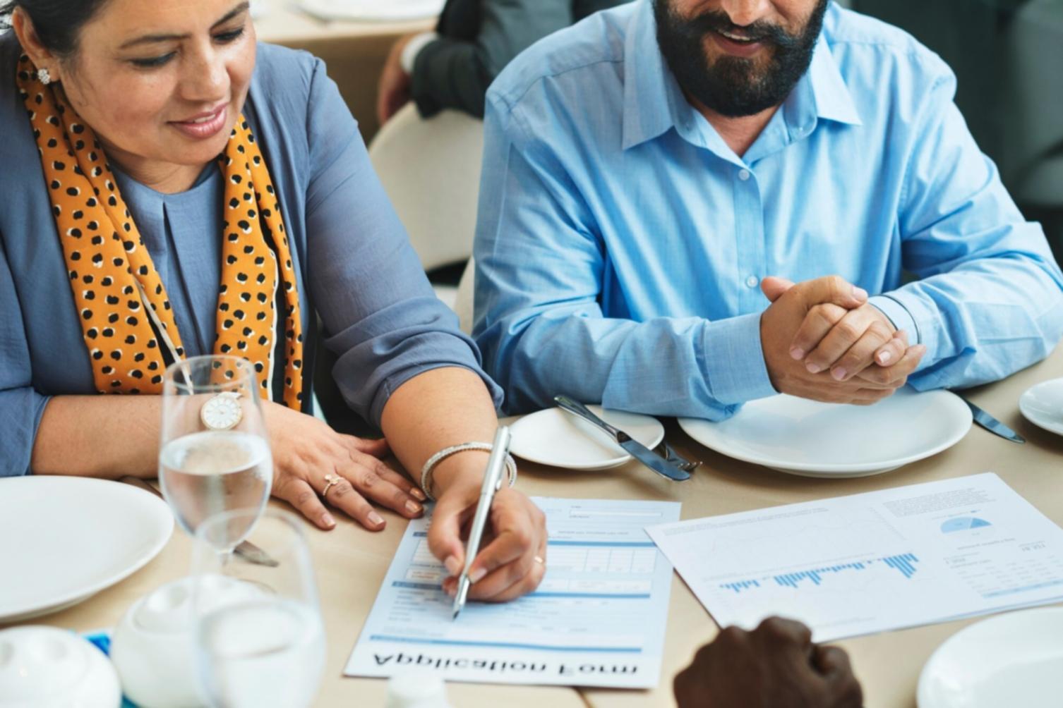 Modern finance professional working with automated systems